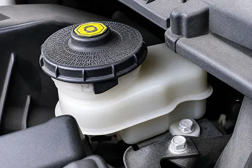 Brake Fluid Reservoir Level Drops Slightly but Pads Look Fine: Normal Wear, Tiny Leak, or Sensor Issue?