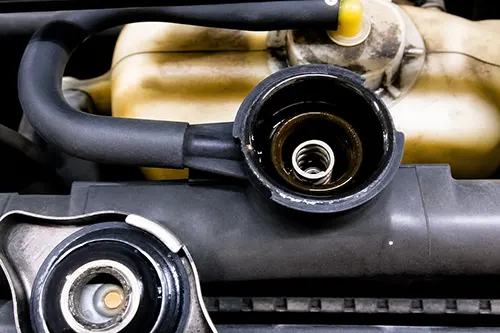 Coolant Overflow Bottle Fills Up but Radiator Stays Low: Cap Recovery Issue or Hidden Air Pocket?