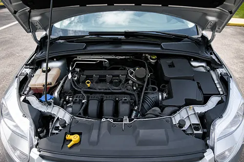 Engine Stalls Only When Parking: Idle Control, Vacuum Change, or Torque Converter Load?