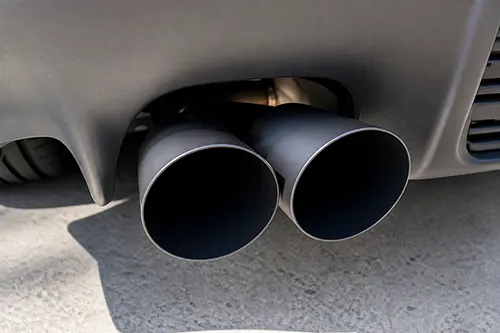 Exhaust Tip Turns Black Quickly on One Side: Rich Running, Short Trips, or Leak-Driven Soot Pattern?