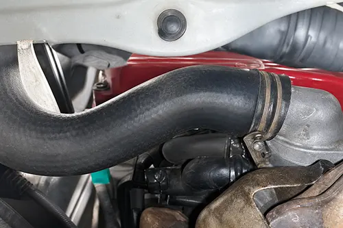 Radiator Hose Feels Rock Hard After Cooldown: Cap Issue, Combustion Gas, or Normal Residual Pressure?