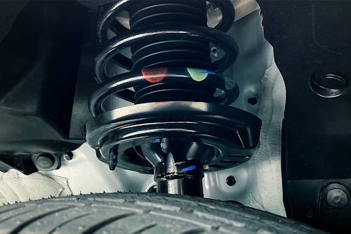 Suspension Refresh: Struts vs Shocks, Alignment Impact and Replacement Timing