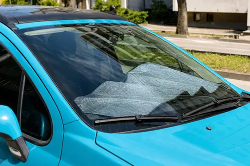 Windshield Makes a Popping Sound on Hot Days: Trim Expansion, Adhesive Release, or Hidden Stress?